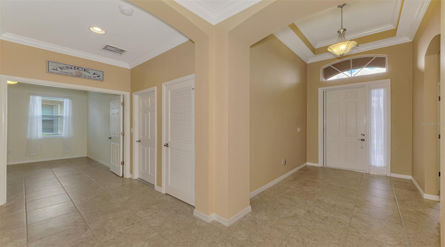 Hallway On Left Leads To Laundry Room And Den/Office