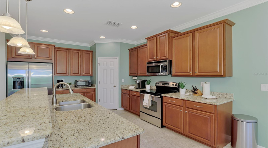 Kitchen Area With Beautiful 42&Quot; Wood Cabinetry
