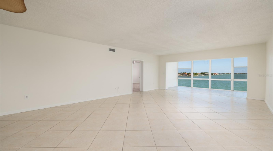 Living Area, Florida Room &Amp; Doorway To Primary Bedroom. Boca Ciega Bay Views.