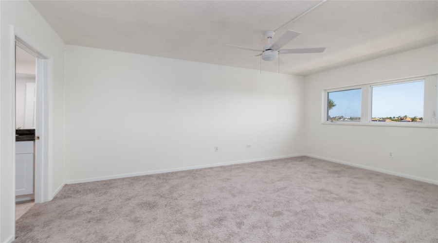 Primary Bedroom W/Bay Views &Amp; En-Suite Bathroom On Left. Large Walk-In Closet.