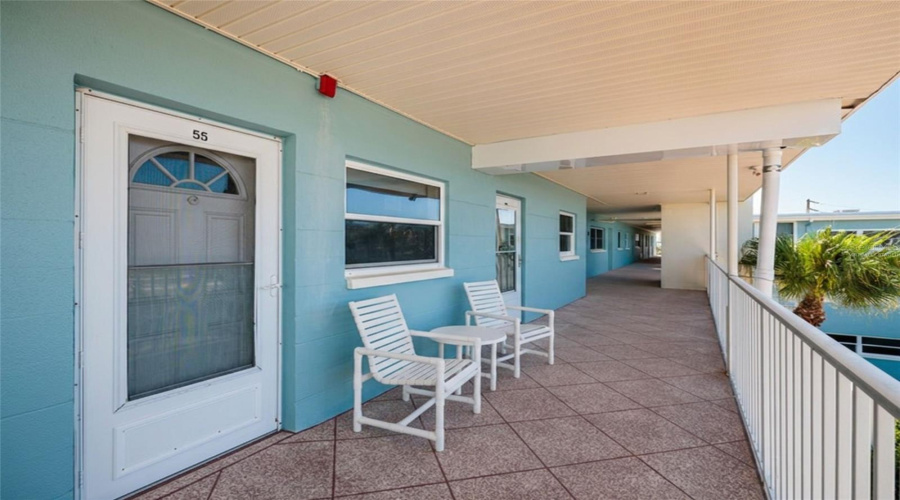 Virtually Staged. Door To 2Nd Bedroom On Left &Amp; Front Door On Right. Elevator In Front Of Next Unit Down Walkway.