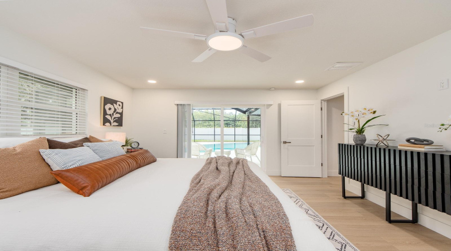 Primary Bedroom Overlooking Pool.