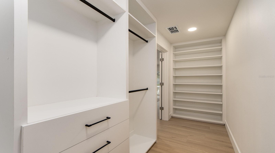 Primary Bdrm Walkin Closet With Built In Closet System