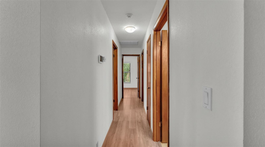 Hallway To 3 Bedrooms
