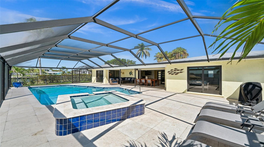 Pool And Spa Are Steps From The Covered Lanai