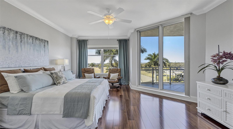 Primary Suite With Dual Walk In Closets, Ensuite Bath And Balcony Access
