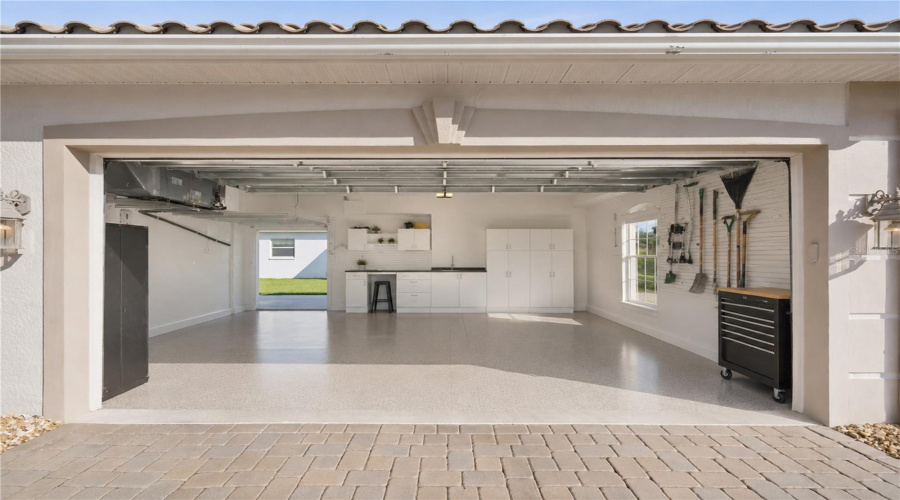 Two Gar Garage Plus Separate Golf Cart Space Entrance