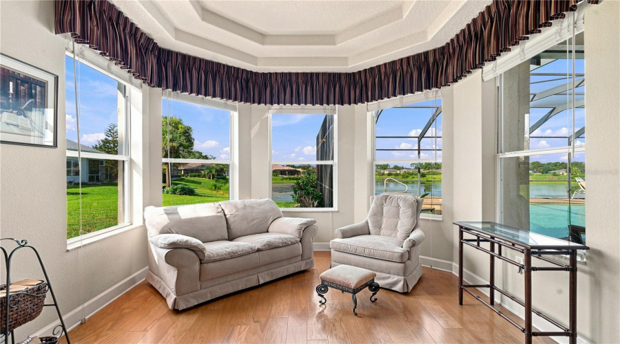 Sitting Area In Primary Bedroom With Water View