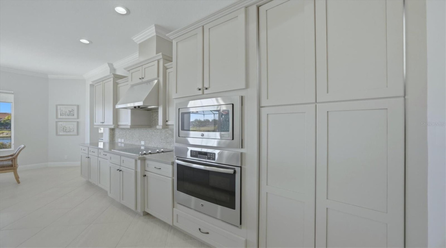 Stainless Appliances, Wall Ovens, Cooktop And Stainless Hood