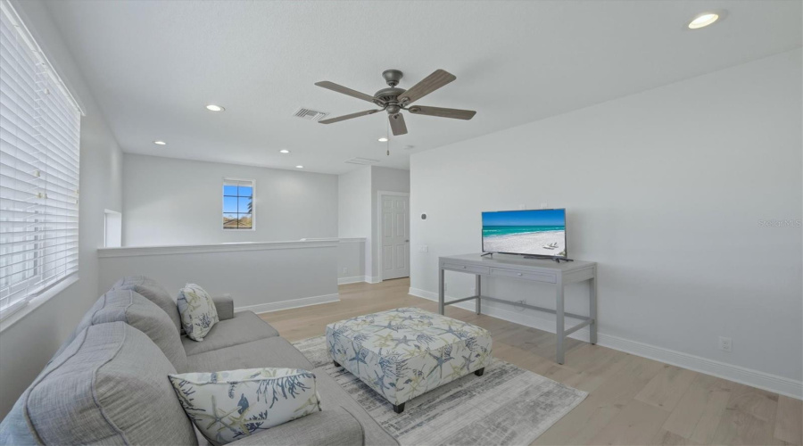Loft Space With Luxury Plank Vinyl Flooring