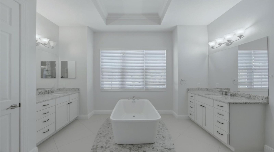 Primary Bathroom With Soaking Bathtub