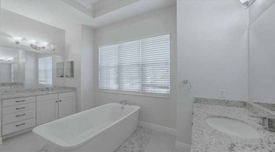 Primary Bathroom With Soaking Bathtub