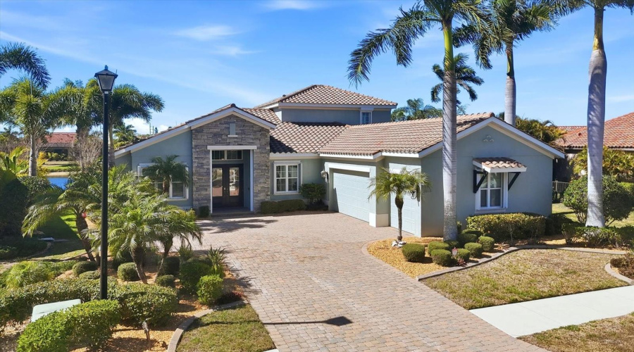Front Of House With 3-Car Side Entry Garage