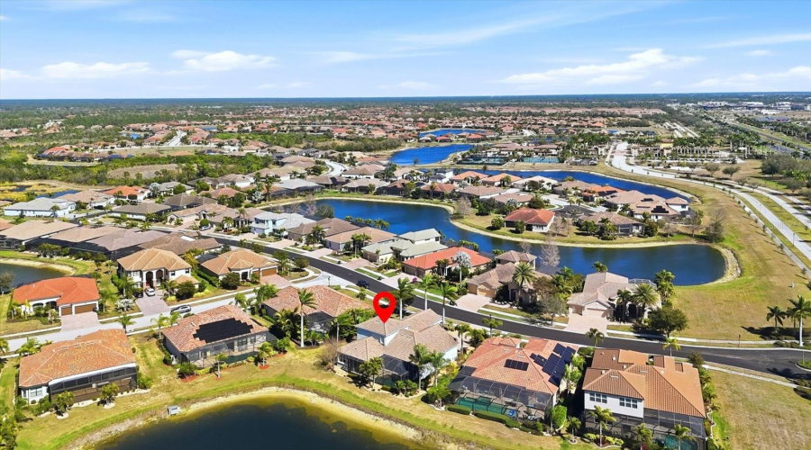 Aerial View Of House Marked By Red Marker