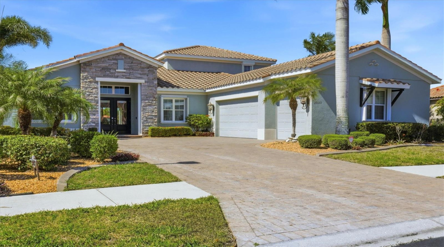 Front Of House With 3-Car Side Entry Garage