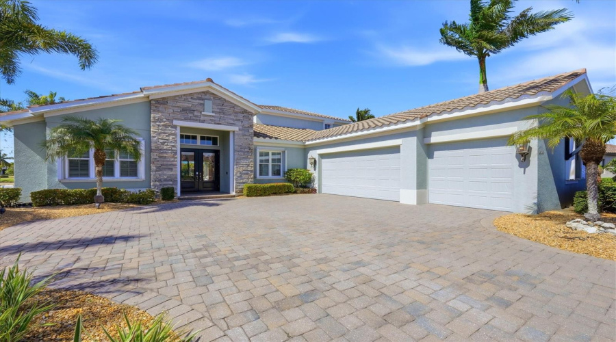 Front Of House With 3-Car Side Entry Garag