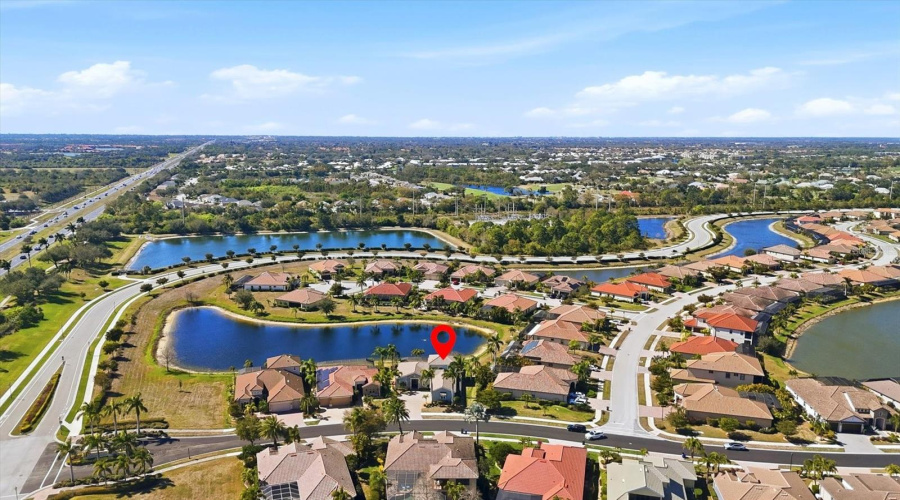Aerial View Of Home On Lake