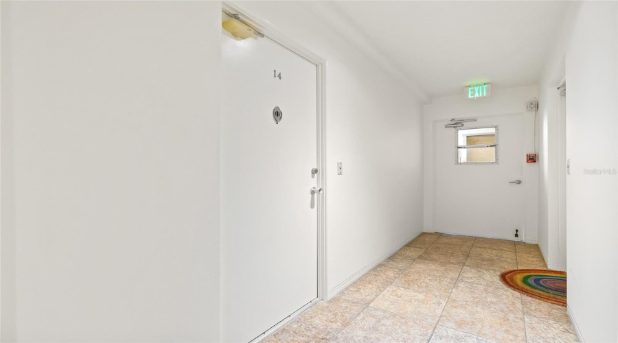 The Door To Enter The Residence Is To The Left, #14. The Door Straight Ahead Is How You Enter The Building. This Is A Secured Door That Requires A Key To Access The Hallway.