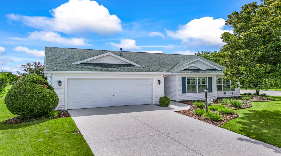 Excellent Curb Appeal With A Spacious 2-Car Garage, Manicured Landscaping, And A Bright, Welcoming Exterior On A Nicely Sized Corner Homesite.