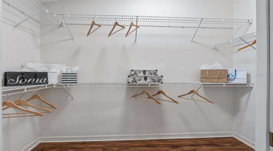 Large Walk-In Closet Provides Excellent Hanging And Storage Space—An Appreciated Feature In The Primary Suite