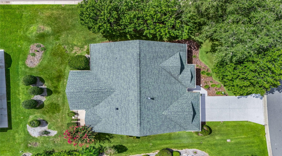 Top-Down View Provides A Great Perspective Of The Home’s Footprint, Roofline, Driveway, And Spacious Lot Positioning.