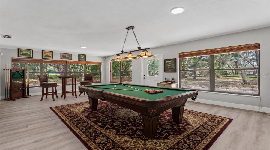 Sunroom Virtually Staged As Gameroom