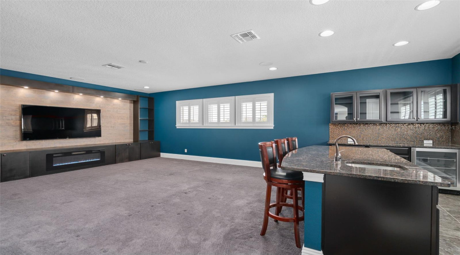 Media Room With Wet Bar And Beverage Fridge