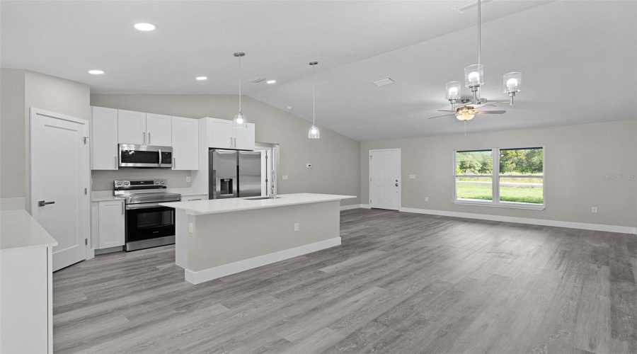 From The Dining Area, Looking Diagonally Across The Open Entertaining Area, With The Corner Pantry Closet On The Far Left