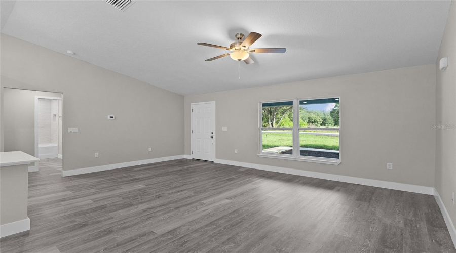 Large Living Area With Ceiling Fan