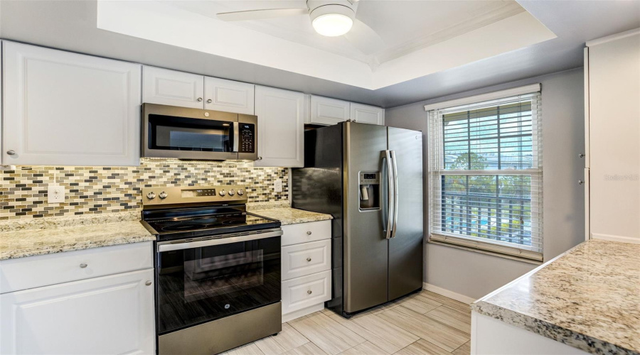 Stainless Appliances And Natural Light