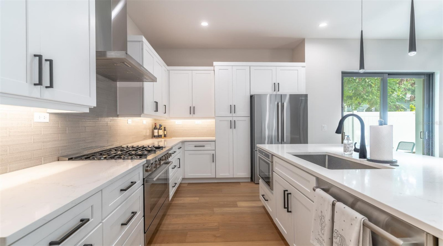 Note The Details, Under Cabinet Lighting, Backsplash Tile And Below Counter Microwayve.