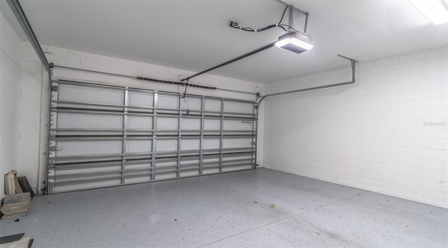 Roomy 2-Car Garage With Room For Storage.