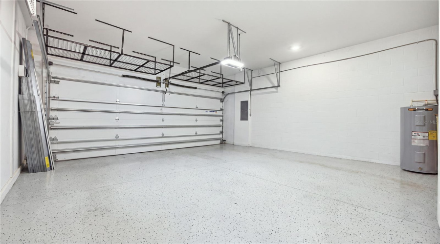 Oversized Garage With High Ceilings And Overhead Storage