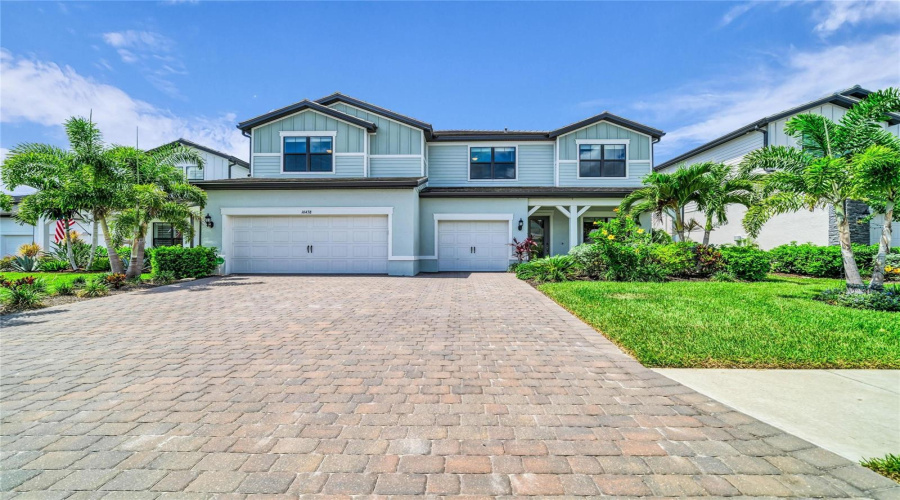 Paver Driveway With A 3 Car Air Conditioned Garage.