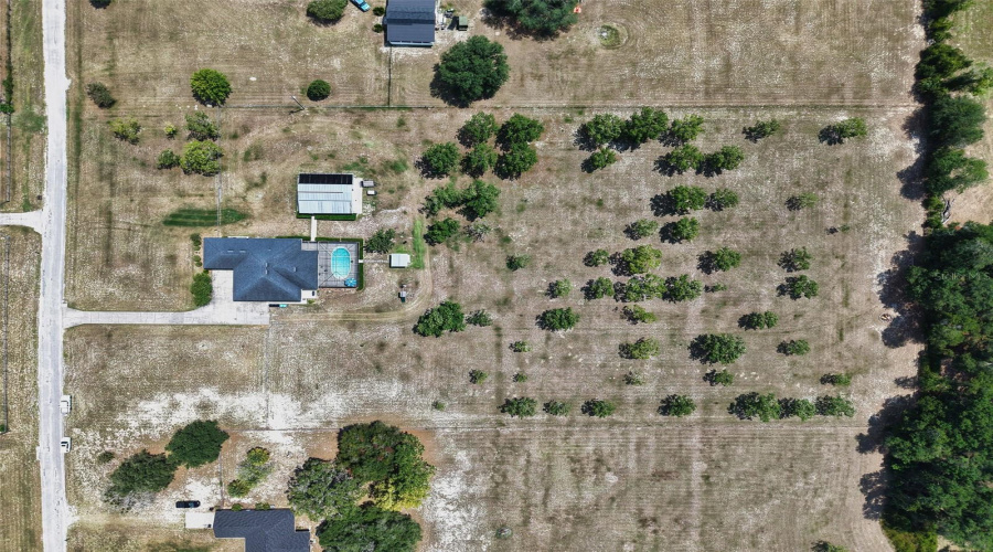 Aerial View Of Home And Orchard