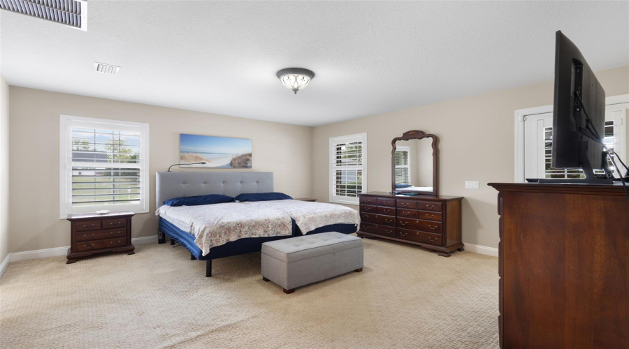 Master Bedroom With Door To Pool Area
