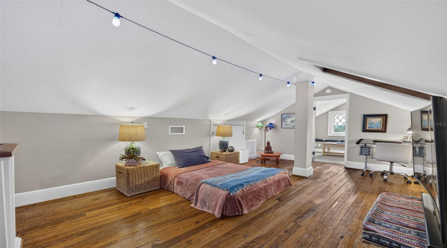 Attic Bedroom Is Private Retreat With Closet/Sitting Room Overlooking Lake. Complete With Heart Pine Wood Floors.