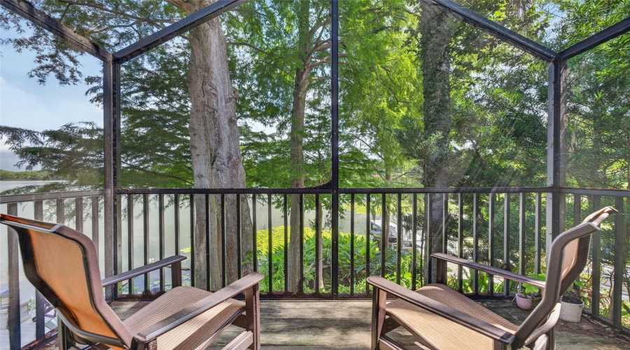 Enjoy Morning Coffee Or Sunsets With A Glass Of Wine Overlooking Lake From Guest House Screened Porch