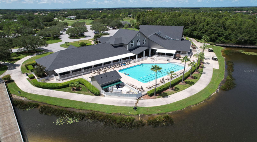 Swimming Pool Overlooking Large Pond