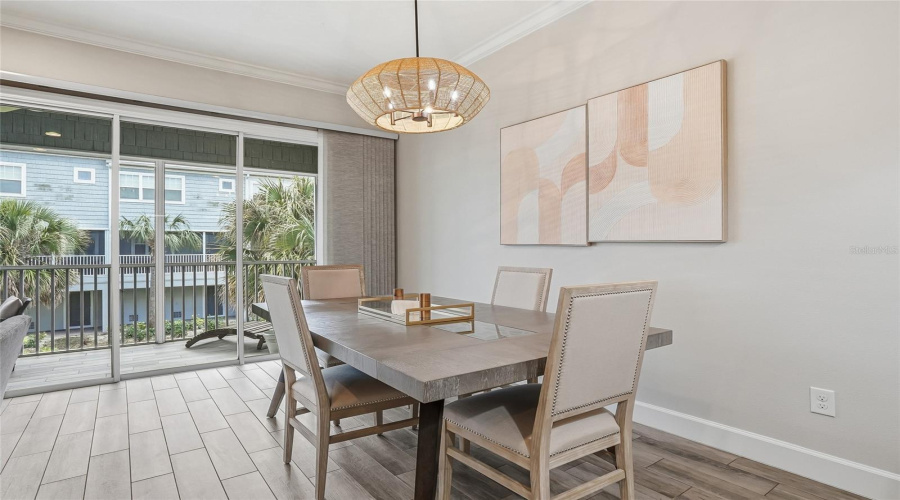 Light-Filled Dining Area With Direct Access To A Screened Terrace And Perfect Added Space For Florida Entertaining.