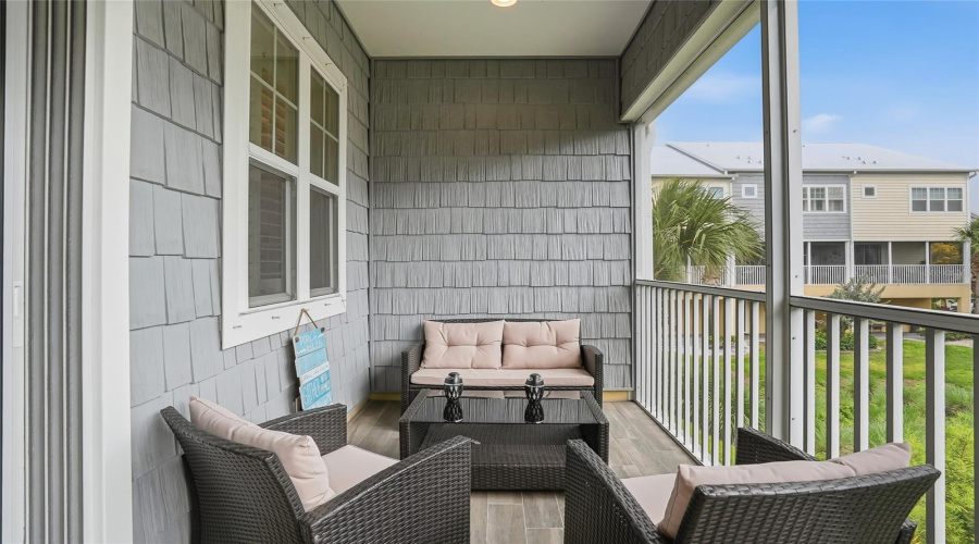 Full Seating Area To Enjoy The Screened In Terrace On The Bright And Warm Florida Winter Days!