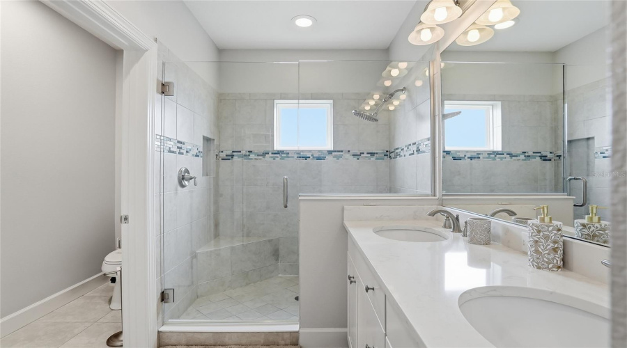 Primary Bathroom With Walk In Shower + Bench