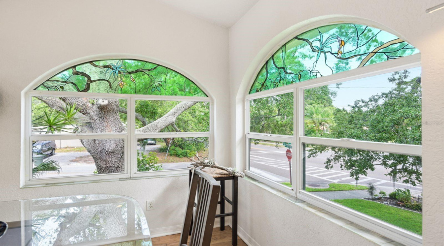 Dining Room Custom Stained Glass Created To Mimic The Oak Tree Coming In From The Outside And Windowsills Lined With Custom Handmade Fused Glass Tiles.
