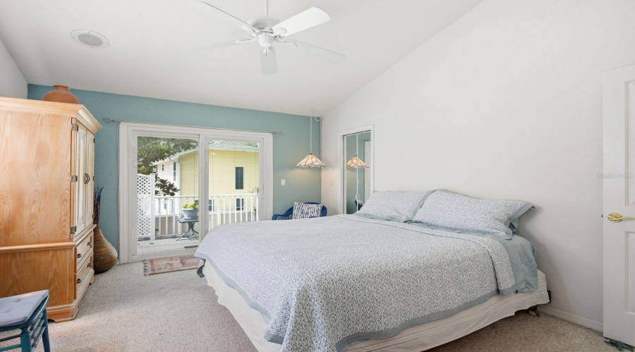 Upstairs Primary Bedroom. Hurricane Rated Sliders With Built In Blinds Lead To Balcony.