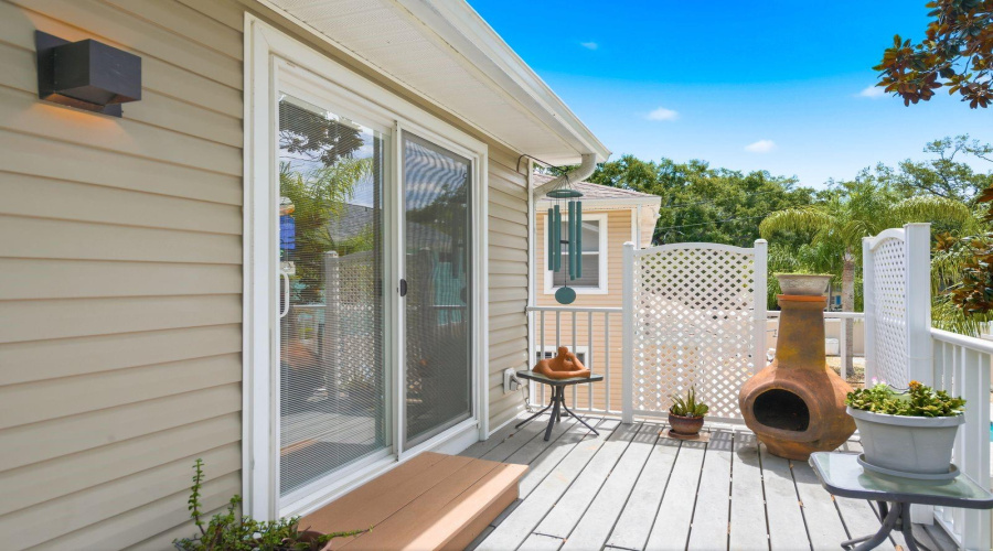 Sliding Glass Door From Primary Bedroom Onto Trex Deck.