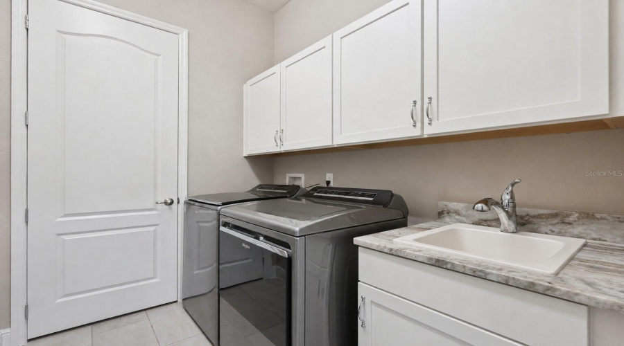 Laundry Room With Built-In Cabinets
