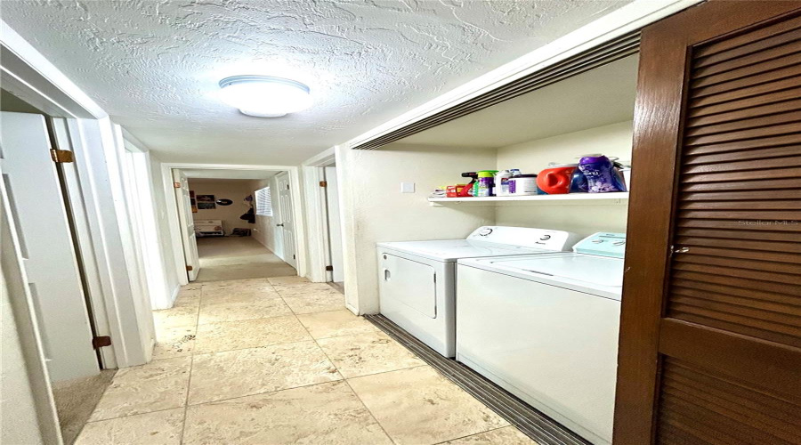 Laundry Closet In Hallway