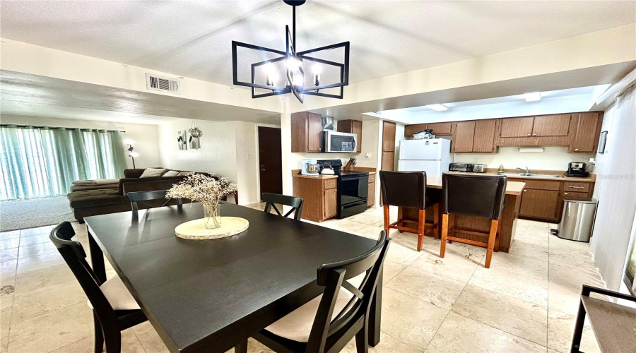 Dining Room And Kitchen With Breakfast Bar