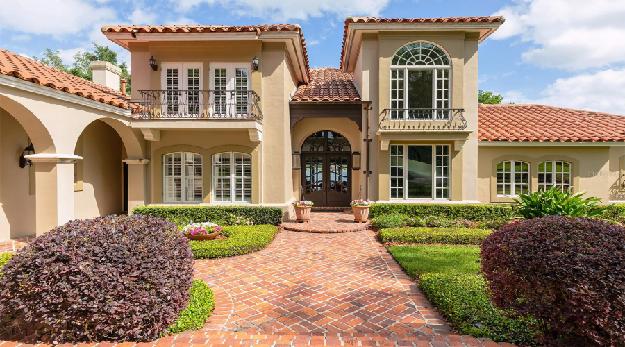 Generous Use Of St. Louis Brick, And Stately Balconies Make For A Regal Entry.