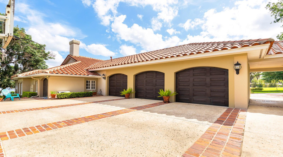 Side Rear 3 Car Garage With Plenty Of Storage Space And Parking.